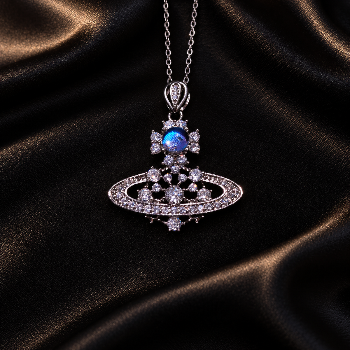 Blue Morpho Saturn necklace — styled display; props not included
