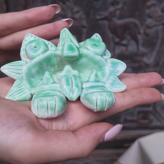 Green glazed Wamao ceramic sculpture — product video