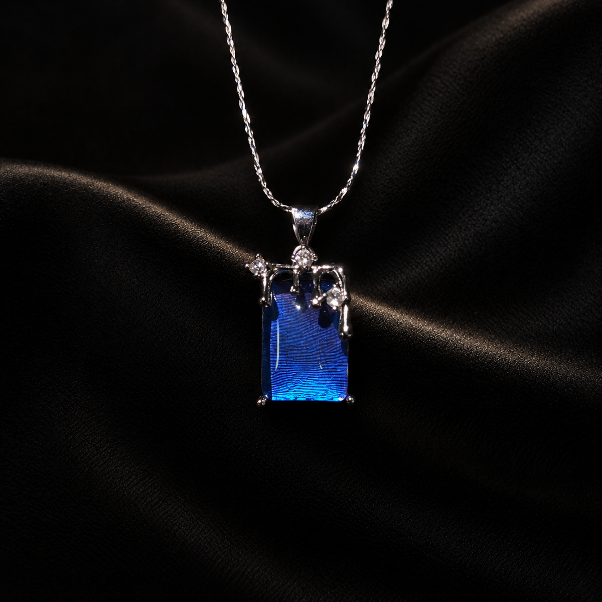 Real Blue Morpho Wing Necklace, Sterling Silver Art Nouveau Bridal Gift — detail view on a dark studio background