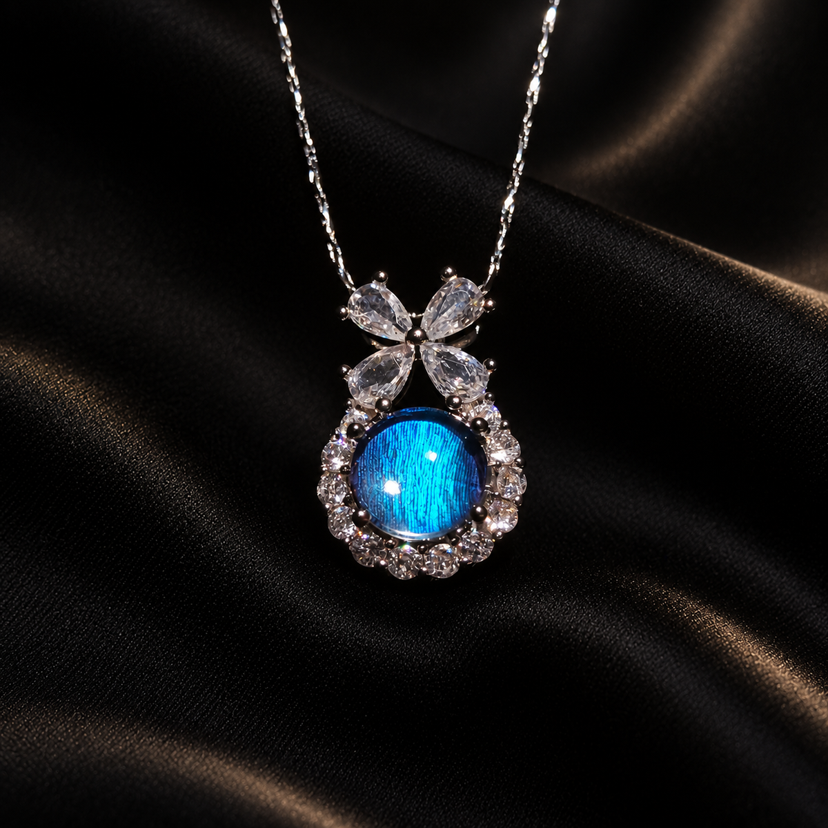 Blue Morpho butterfly wing bow necklace — front product view