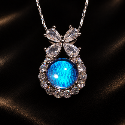 Blue Morpho butterfly wing bow necklace — wing and setting detail