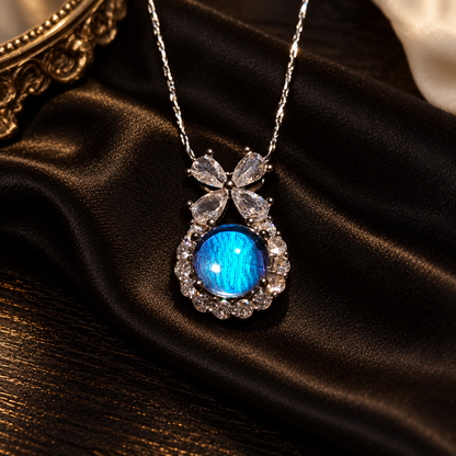 Blue Morpho butterfly wing bow necklace — dressing table setting; styling props not included