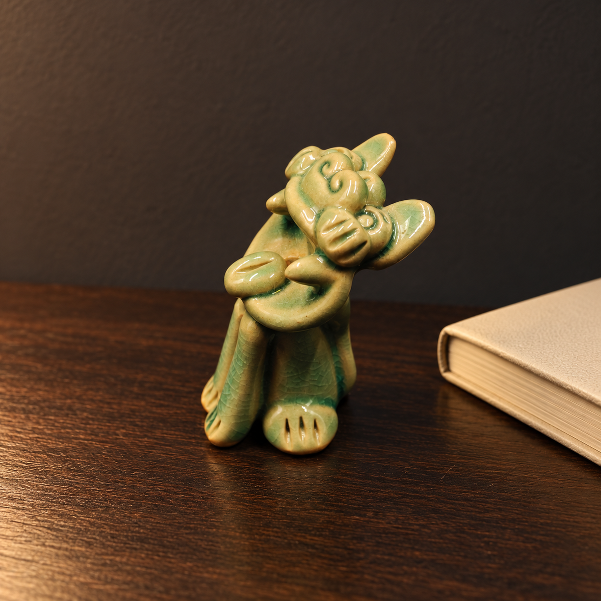Green crackle-glaze Wamao guardian cat — Quiet reading corner scene