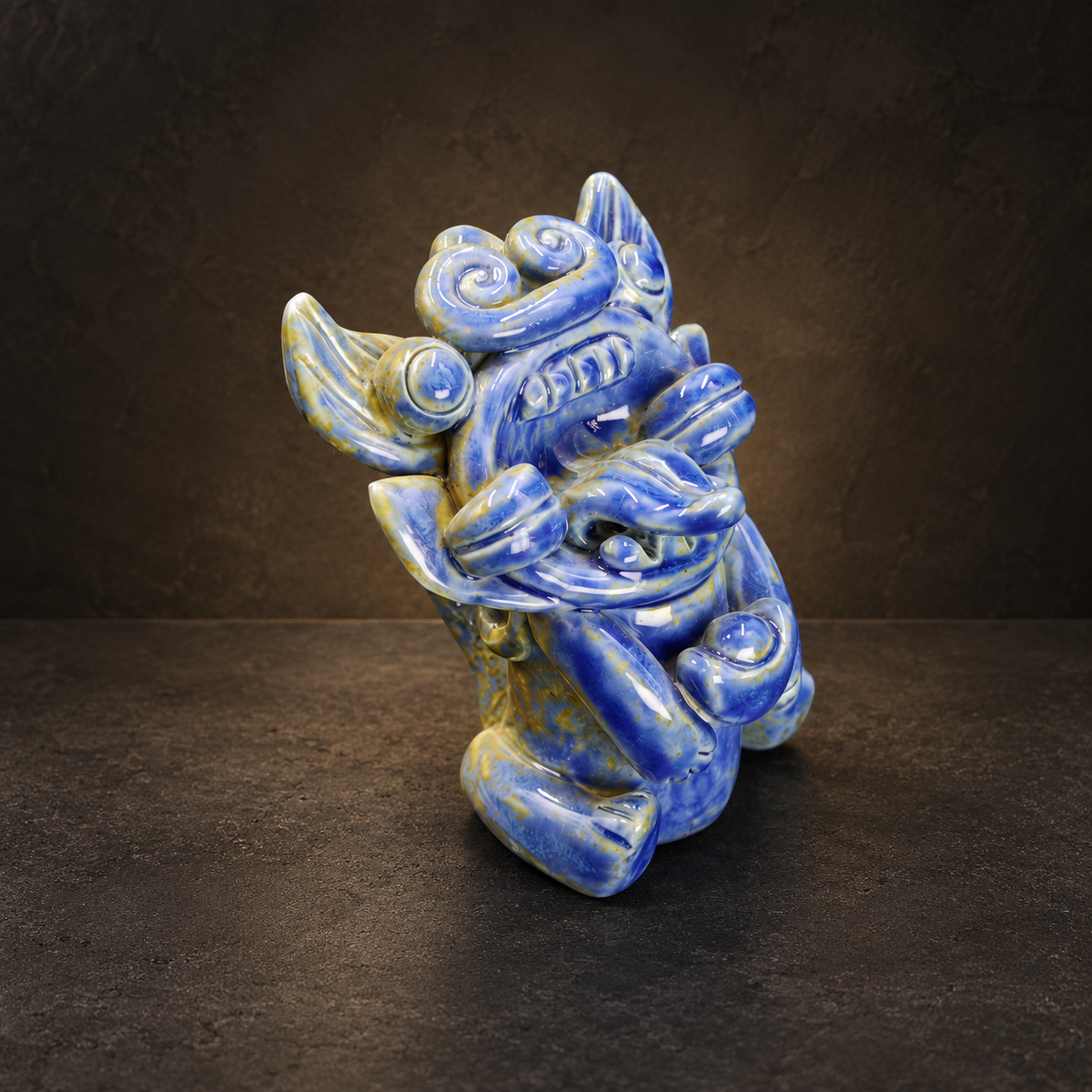 Blue-Glazed Wamao Guardian Cat Figurine — Holding Ingot