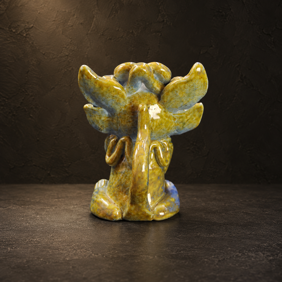 Blue-glazed ingot-holding Wamao guardian cat — Documented rear view