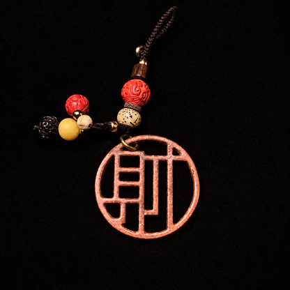 Bantong copper Cai bag charm — Openwork detail